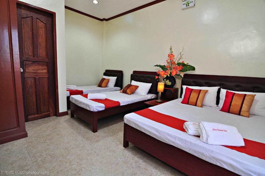 Jilian Tourist Inn Puerto Princesa Pokoj fotografie
